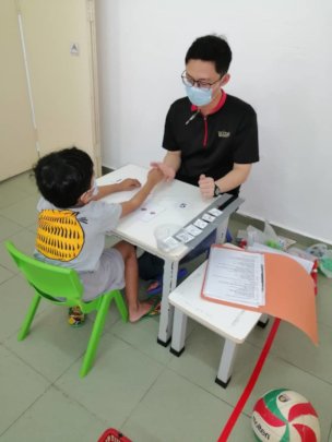 EIP teacher with student